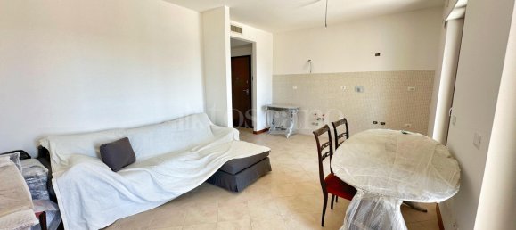 Квартира с 2 комнатами в Фьюмичино, Италия № 331972 9