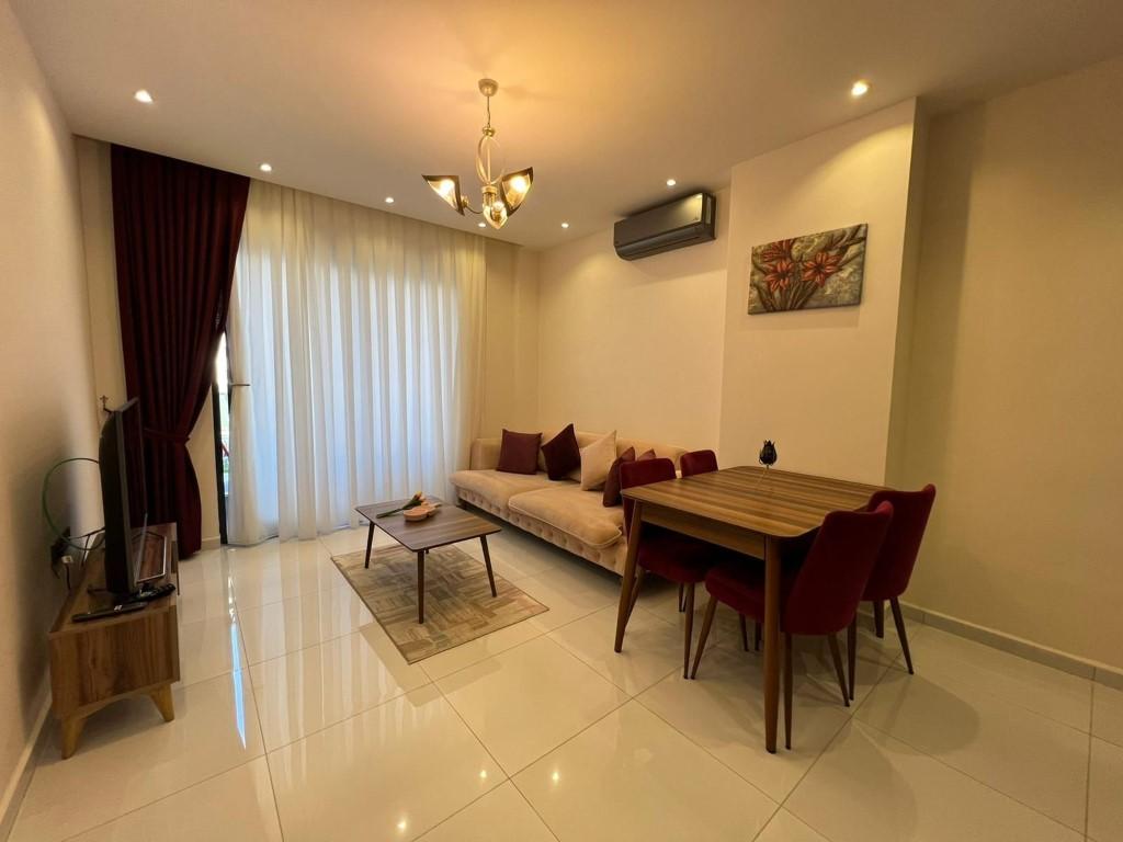 Квартира с 2 комнатами в Махмутлар, Турция № 44051