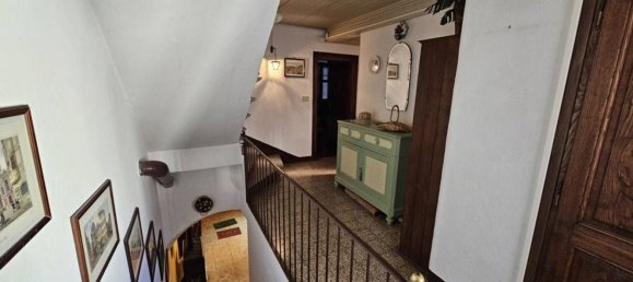 Дом с 7 комнатами в Камандона, Италия № 211920 24