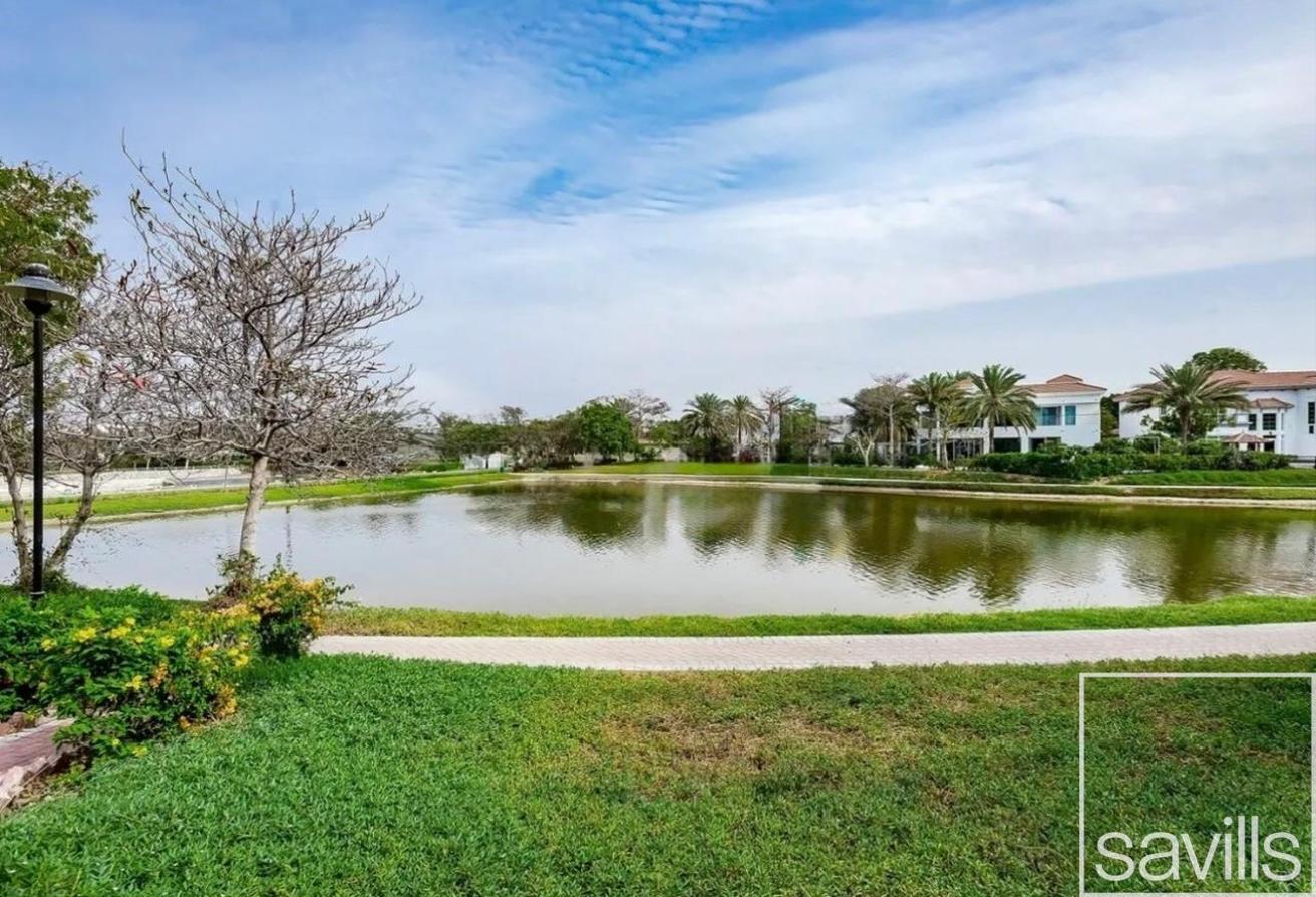 Вилла с 4 спальнями в Jumeirah Islands, ОАЭ № 112092