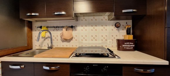 3-salle Appartement à Borno, Italy No. 25202 19