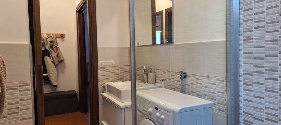 3-salle Appartement à Borno, Italy No. 25202 4