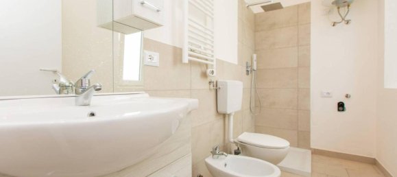 Квартира с 2 комнатами в Ольджате Олона, Италия № 40841 14