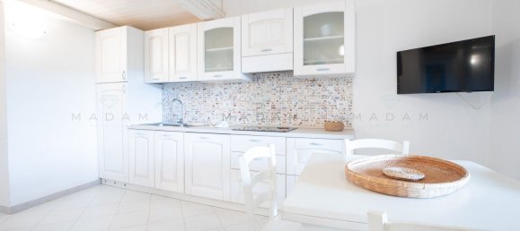 Квартира с 2 комнатами в Ольбия, Италия № 124997 9