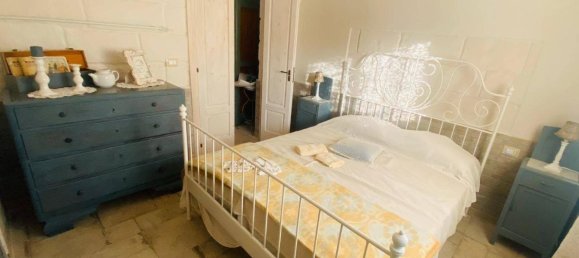 Дом с 6 комнатами в Каровиньо, Италия № 80169 16