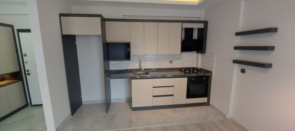 Квартира 1+1 в Мерсин, Турция № 21336 2