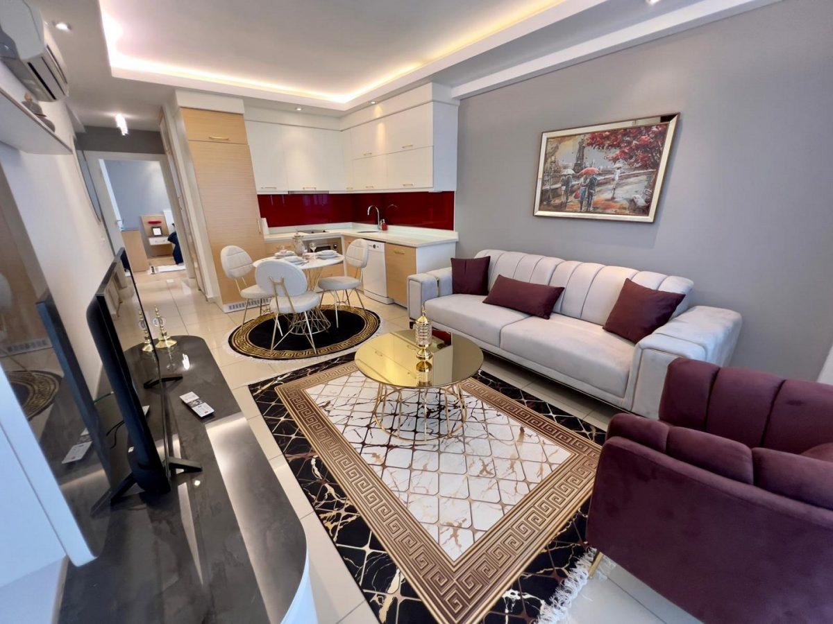 Квартира с 2 комнатами в Кестель, Турция № 19531